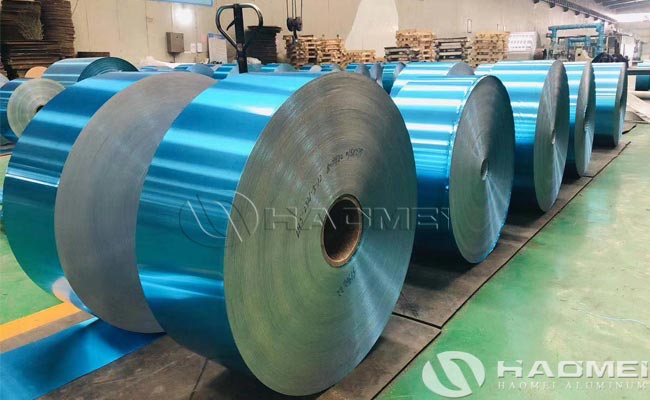 Aluminum strip for heat exchanger fins with blue coating
